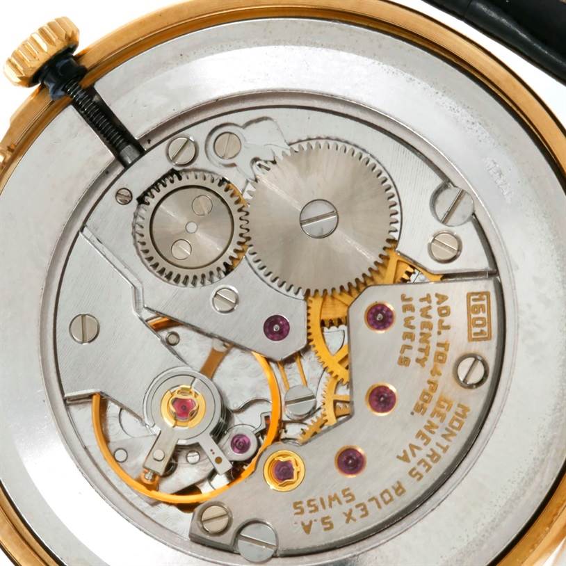 This image shows a close-up view of the movement parts of a Rolex Cellini 5112 Men's Yellow Gold Mother of Pearl Dial 5112 Men's Yellow Gold Mother of Pearl Dial watch.