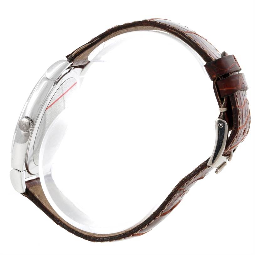 The image shows a side view of a Rolex Cellini 5330 Men's White Gold Mother of Pearl Dial 5330 Men's White Gold Mother of Pearl Dial watch, highlighting its case, crown, and leather strap with clasp.