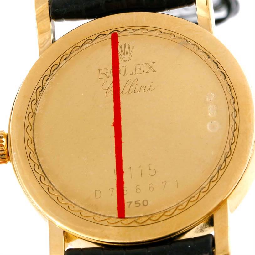 This image shows the case back of a Rolex Cellini 5115 Men
s Yellow Gold Champagne Dial 5115 Men
s Yellow Gold Champagne Dial watch, focused on the engraved details.