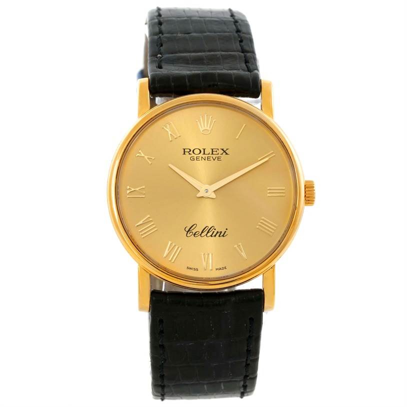 The Rolex Cellini 5115 Men
s Yellow Gold Champagne Dial 5115 Men
s Yellow Gold Champagne Dial watch is shown from the front, displaying the gold dial, Roman numerals, gold case, and black leather strap.