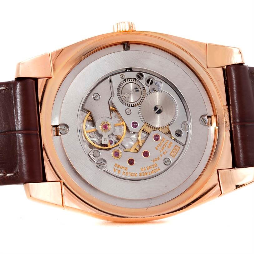 The image shows the back view of a Rolex Cellini 5330 Men's Rose Gold Grey Dial 5330 Men's Rose Gold Grey Dial watch, displaying its intricate internal mechanics and movement.
