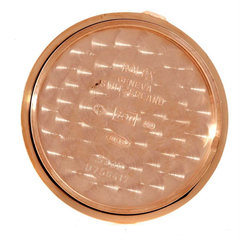 This image shows the inside of the case back of a Rolex Cellini 5330 Men's Rose Gold Grey Dial 5330 Men's Rose Gold Grey Dial watch, highlighting inscriptions and markings.