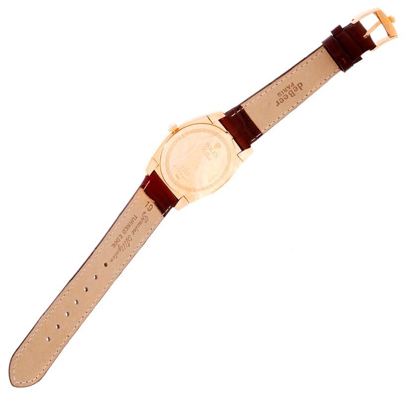 The image shows the back case and brown leather strap of a Rolex Cellini 5330 Men's Rose Gold Grey Dial 5330 Men's Rose Gold Grey Dial watch, laid flat.