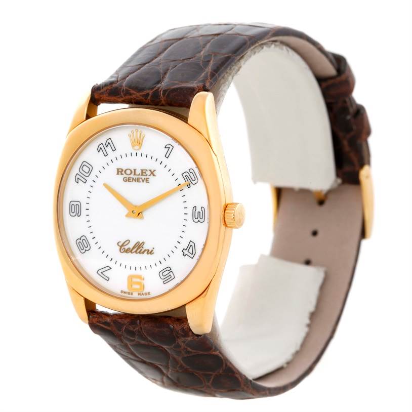 This image shows a Rolex Cellini 4233 Men
s Yellow Gold White Dial 4233 Men
s Yellow Gold White Dial watch at a slight angle, highlighting the gold case, white dial, and brown leather strap.