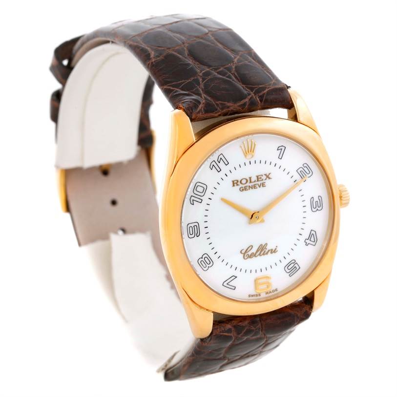 The image shows a Rolex Cellini 4233 Men
s Yellow Gold White Dial 4233 Men
s Yellow Gold White Dial watch at a three-quarter angle, highlighting the face, strap, and crown.