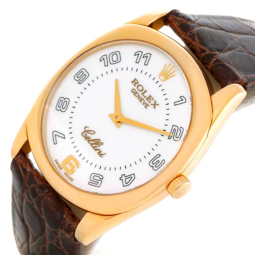 The image shows a close-up of the Rolex Cellini 4233 Men
s Yellow Gold White Dial 4233 Men
s Yellow Gold White Dial watch, highlighting its face, crown, and leather strap from a slight angled perspective.
