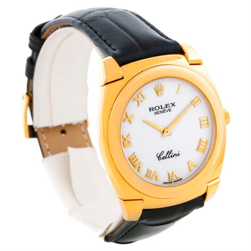 The Rolex Cellini 5330 Men's Yellow Gold White Dial 5330 Men's Yellow Gold White Dial watch is shown at a slight angle, featuring its gold casing, white dial with Roman numerals, and black leather strap.