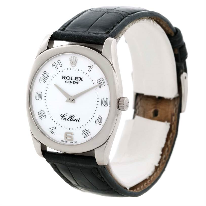 The Rolex Cellini 4233 Men's White Gold White Dial 4233 Men's White Gold White Dial watch is shown at a slight angle, displaying its white dial, numerals, and black leather strap.
