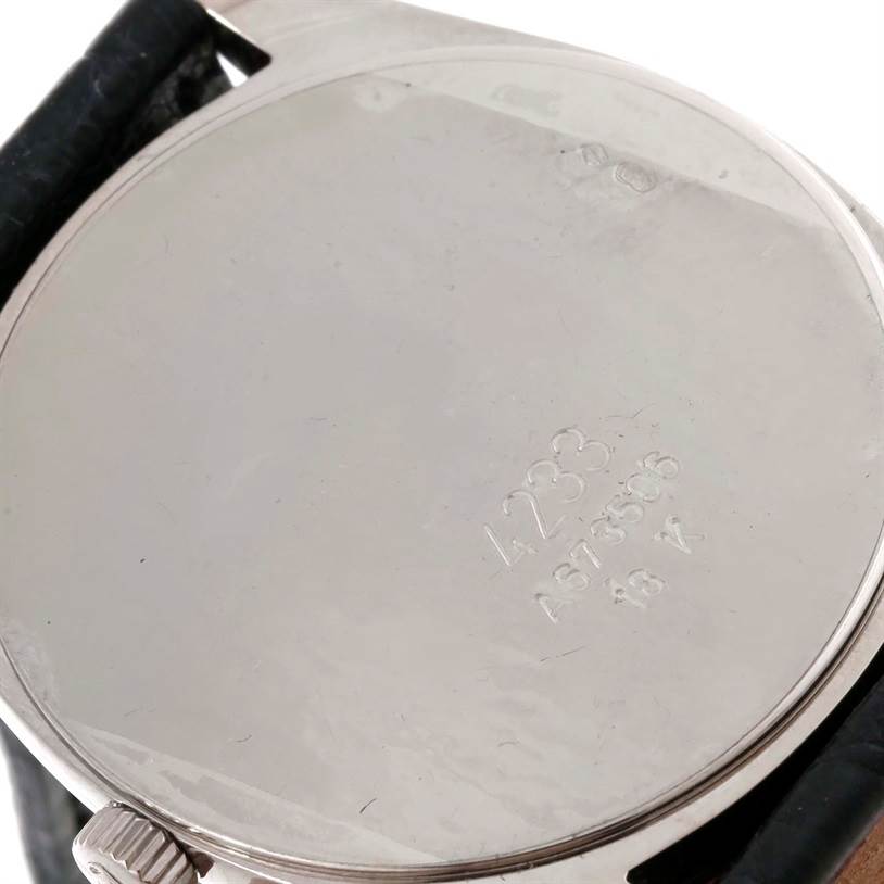 The image shows the back side of a Rolex Cellini 4233 Men's White Gold White Dial 4233 Men's White Gold White Dial watch, displaying its case and part of the strap.