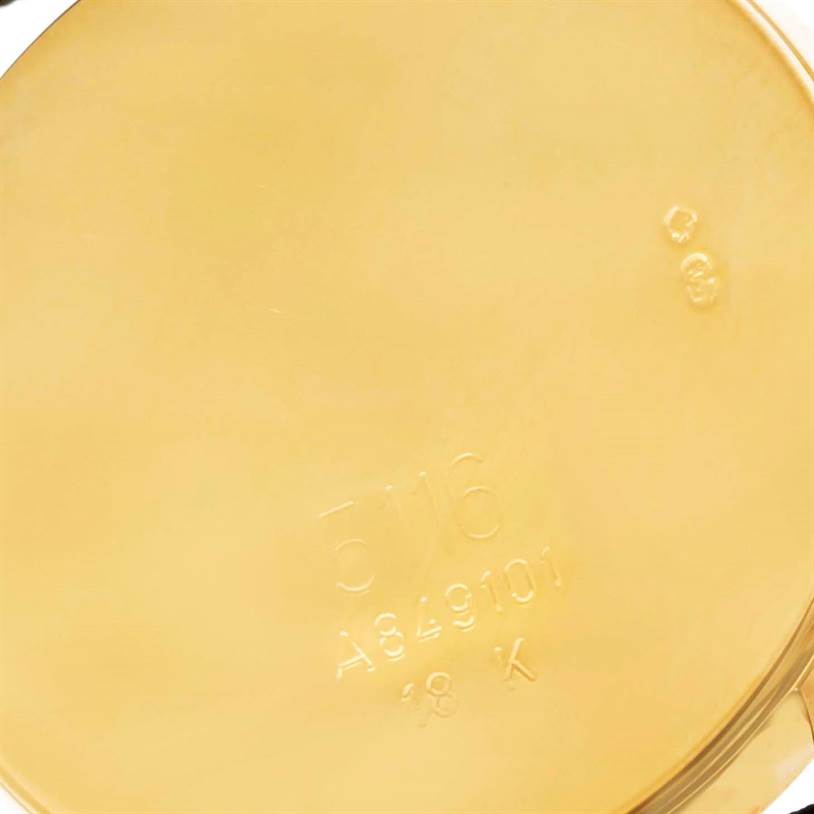 This image shows the back case of the Rolex Cellini 5116 Men
s Yellow Gold Black Dial 5116 Men
s Yellow Gold Black Dial watch, revealing its engravings and gold material.