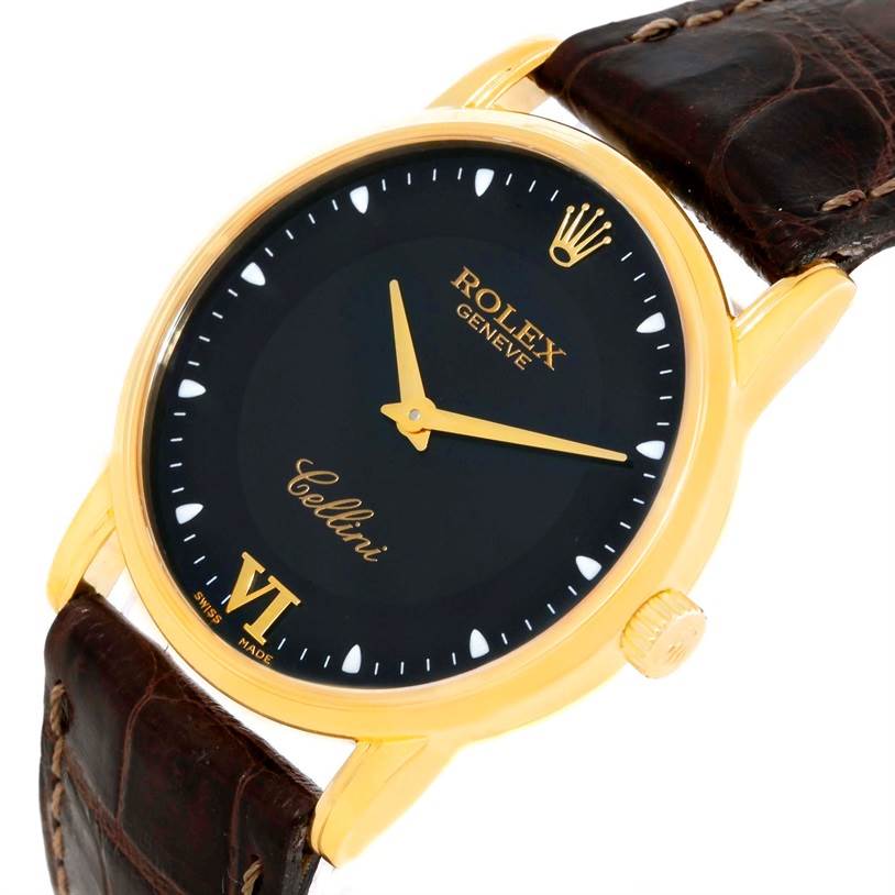 The Rolex Cellini 5116 Men
s Yellow Gold Black Dial 5116 Men
s Yellow Gold Black Dial watch is shown at a slight angle, highlighting the dial, hands, crown, and part of the leather strap.