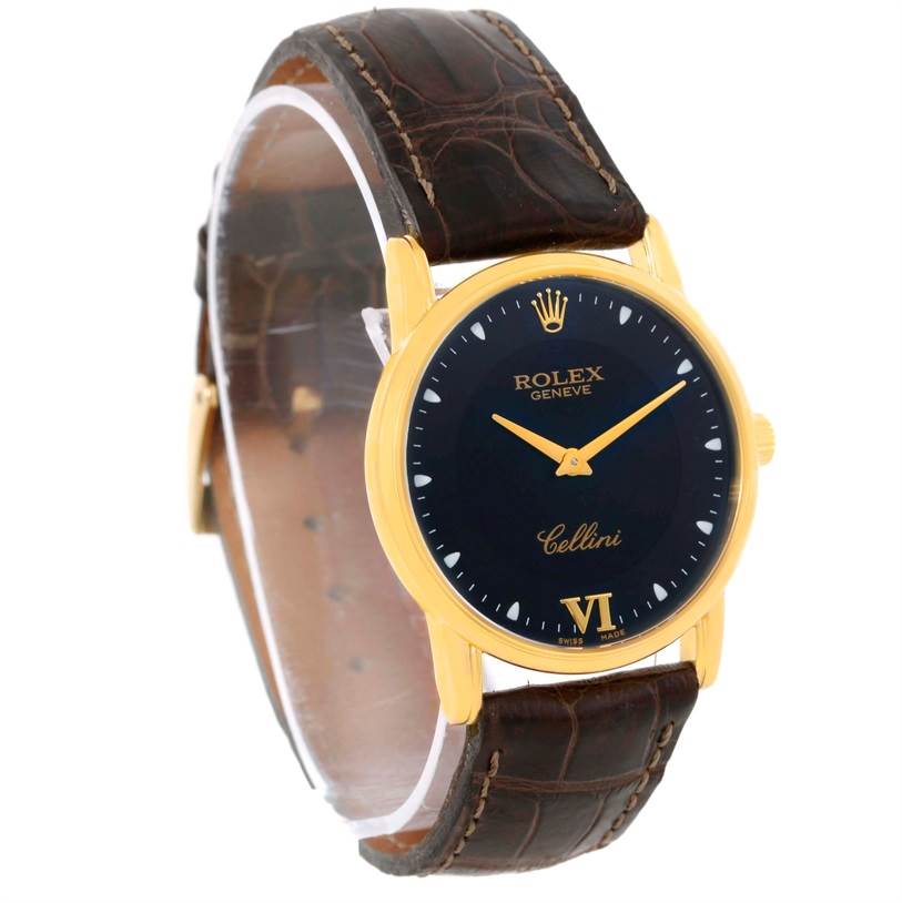 This image shows a front angle view of a Rolex Cellini 5116 Men
s Yellow Gold Black Dial 5116 Men
s Yellow Gold Black Dial model watch, featuring its dial, bezel, and leather strap.