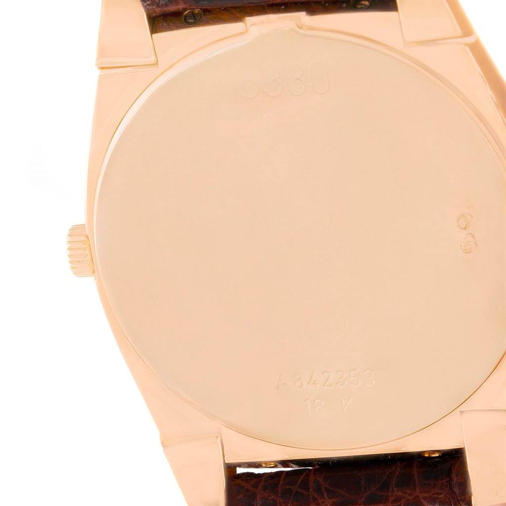 The image shows the back case of a Rolex Cellini 5330 Men's Rose Gold White Dial 5330 Men's Rose Gold White Dial watch, highlighting its smooth finish and markings.