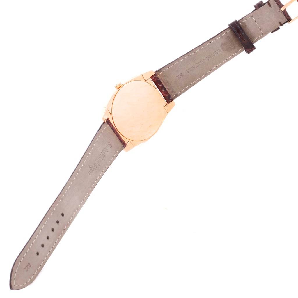 The image shows the back view of a Rolex Cellini 5330 Men's Rose Gold White Dial 5330 Men's Rose Gold White Dial watch, highlighting its straps and case back.