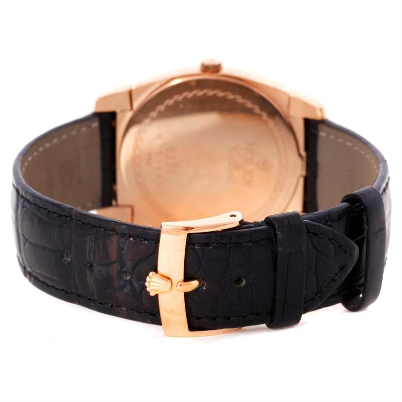 The image shows the back of a Rolex Cellini 5330 Men's Rose Gold Grey Dial 5330 Men's Rose Gold Grey Dial watch, highlighting the leather strap and the gold clasp.