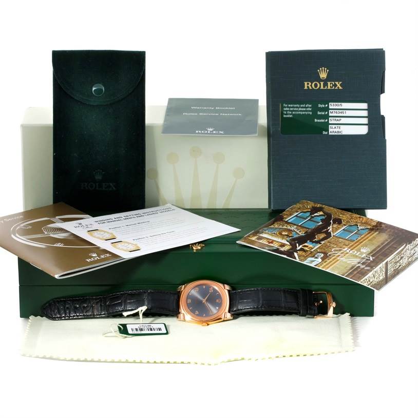 The image shows a Rolex Cellini 5330 Men's Rose Gold Grey Dial 5330 Men's Rose Gold Grey Dial watch with its box, warranty card, booklets, and a protective pouch, all viewed from the top angle.
