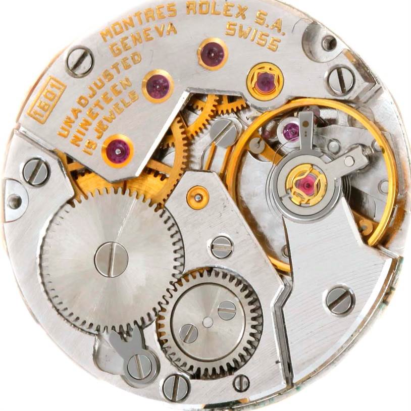 This image shows the internal mechanical movement of a Rolex Cellini 4014 Men's Yellow Gold Orange Dial 4014 Men's Yellow Gold Orange Dial watch.