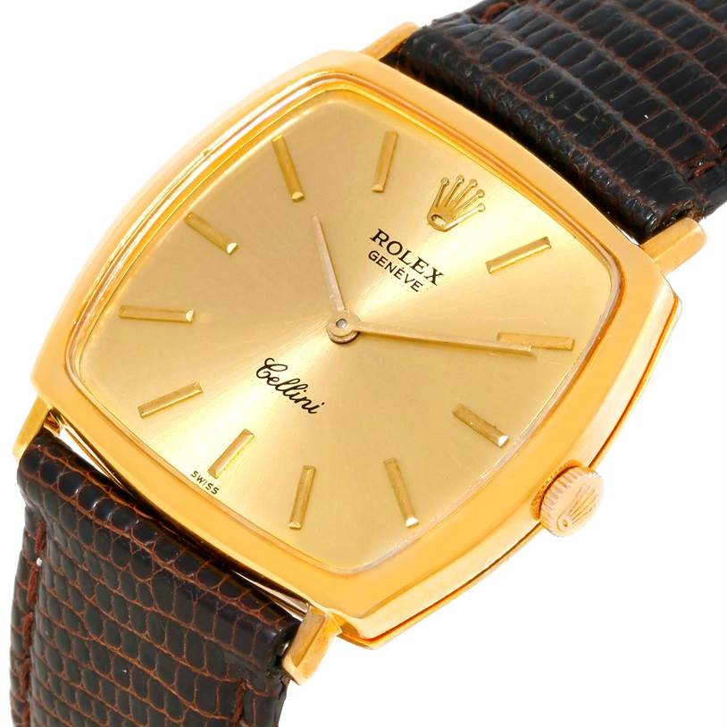 This image shows a close-up view of a Rolex Cellini 3805 Men's Yellow Gold Champagne Dial 3805 Men's Yellow Gold Champagne Dial watch, featuring its gold case, dial, and dark leather strap.