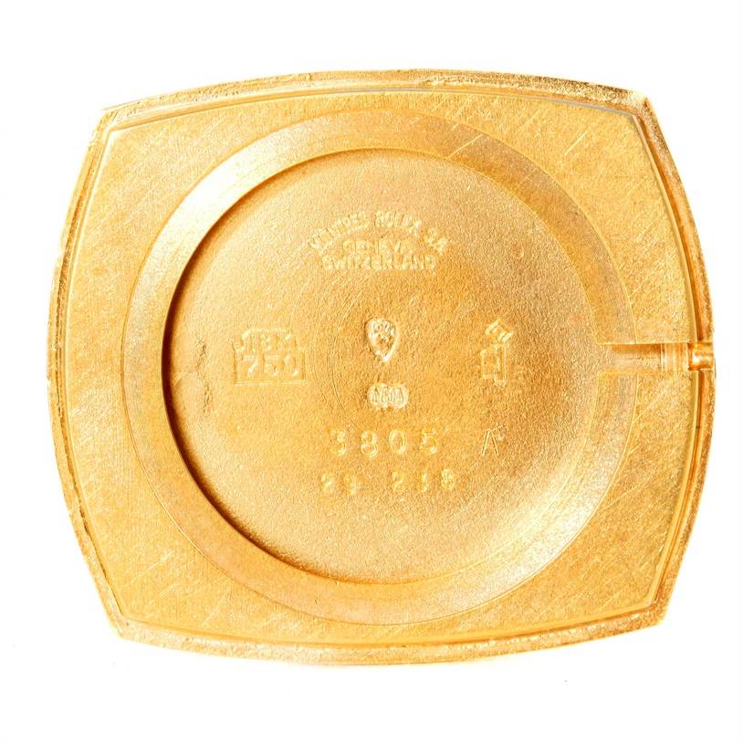 This image shows the back cover of a Rolex Cellini 3805 Men's Yellow Gold Champagne Dial 3805 Men's Yellow Gold Champagne Dial watch, highlighting engravings and hallmarks.