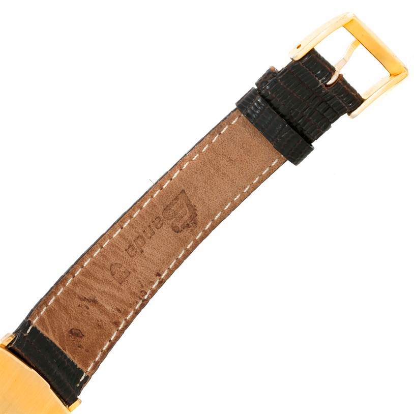 The image shows the leather strap and clasp of a Rolex Cellini 3805 Men's Yellow Gold Champagne Dial 3805 Men's Yellow Gold Champagne Dial watch from a side angle.
