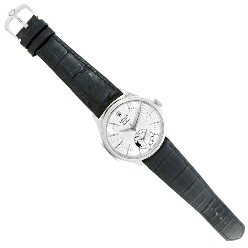 The image shows a Rolex Cellini 50529 Men's White Gold Silver Dial 50529 Men's White Gold Silver Dial watch at an angled top-down view, featuring its face, bezel, and leather strap with buckle.