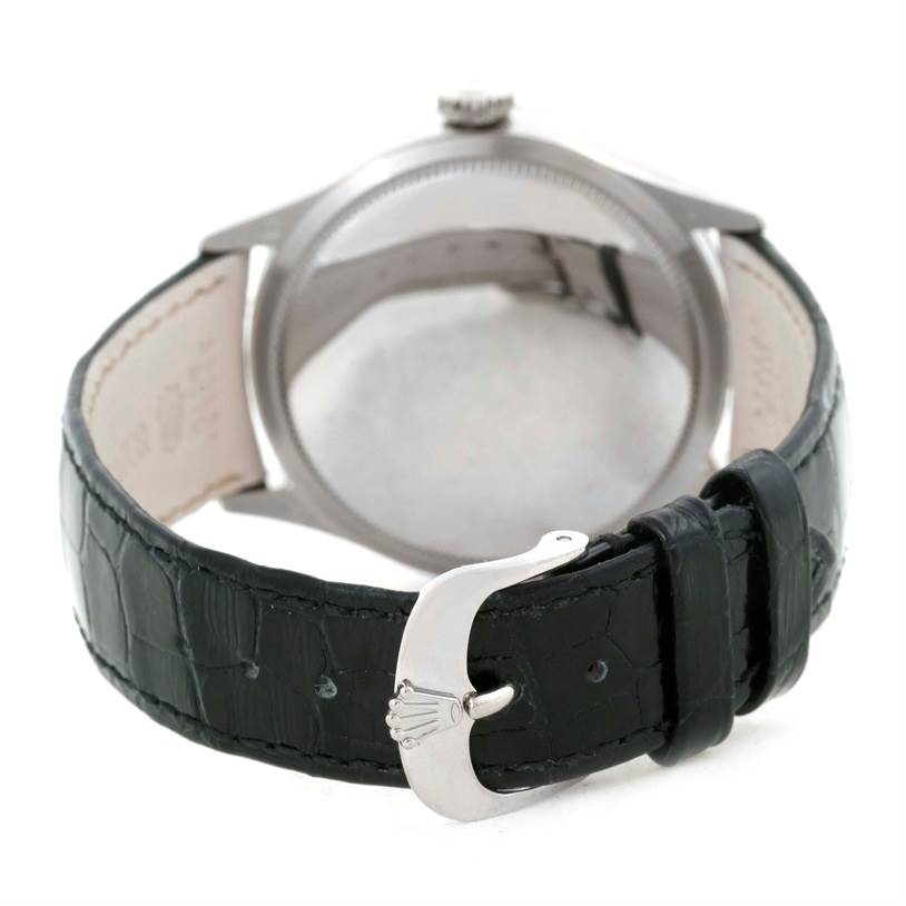 This image shows the back view of a Rolex Cellini 50529 Men's White Gold Silver Dial 50529 Men's White Gold Silver Dial watch, highlighting its buckle and leather strap.