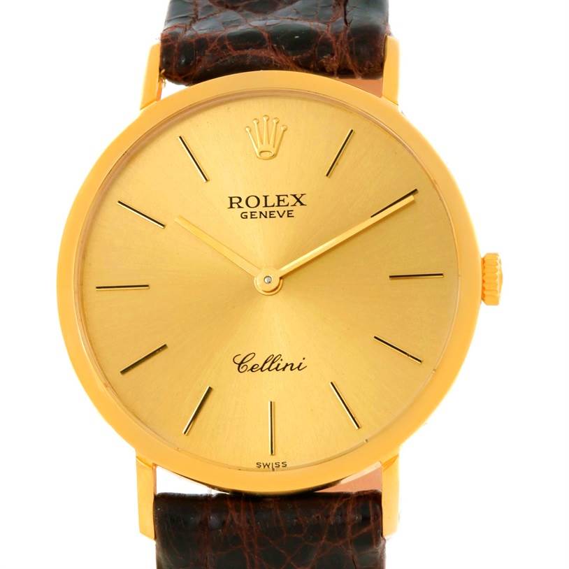 The image shows a front view of a Rolex Cellini 4112 Men
s Yellow Gold Champagne Dial 4112 Men
s Yellow Gold Champagne Dial watch, highlighting its gold dial, gold hands, and leather strap.