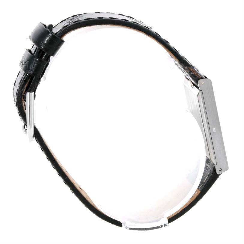 This image shows a side view of a Rolex Cellini 4014 Men's White Gold Silver Dial 4014 Men's White Gold Silver Dial watch highlighting its black leather strap and metal case.