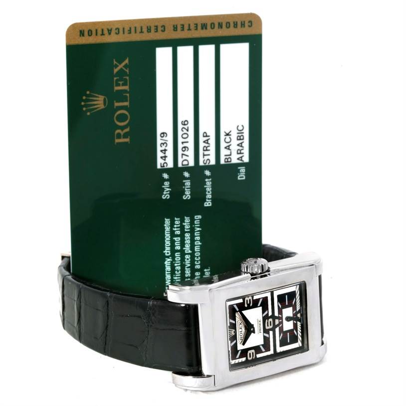 The image shows a Rolex Cellini 5443 Men's White Gold Black Dial 5443 Men's White Gold Black Dial watch placed horizontally, alongside its certification card.