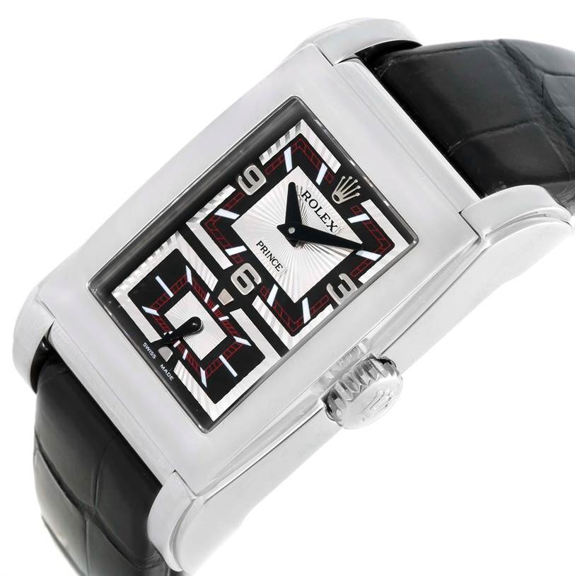 The image shows a side-angle view of the Rolex Cellini 5443 Men's White Gold Black Dial 5443 Men's White Gold Black Dial Prince watch, highlighting the rectangular dial, crown, and black leather strap.