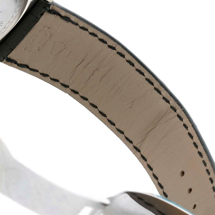 The image shows the close-up inner view of the leather strap and part of the case of a Rolex Cellini 4243/8 Men
s White Gold Silver Dial 4243/8 Men
s White Gold Silver Dial watch.