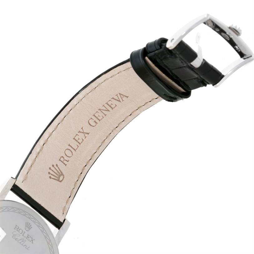 The image shows the rear view of the Rolex Cellini 5115 Men's White Gold Grey Dial 5115 Men's White Gold Grey Dial watch's leather strap and buckle, showcasing the "Rolex Geneva" engraving.