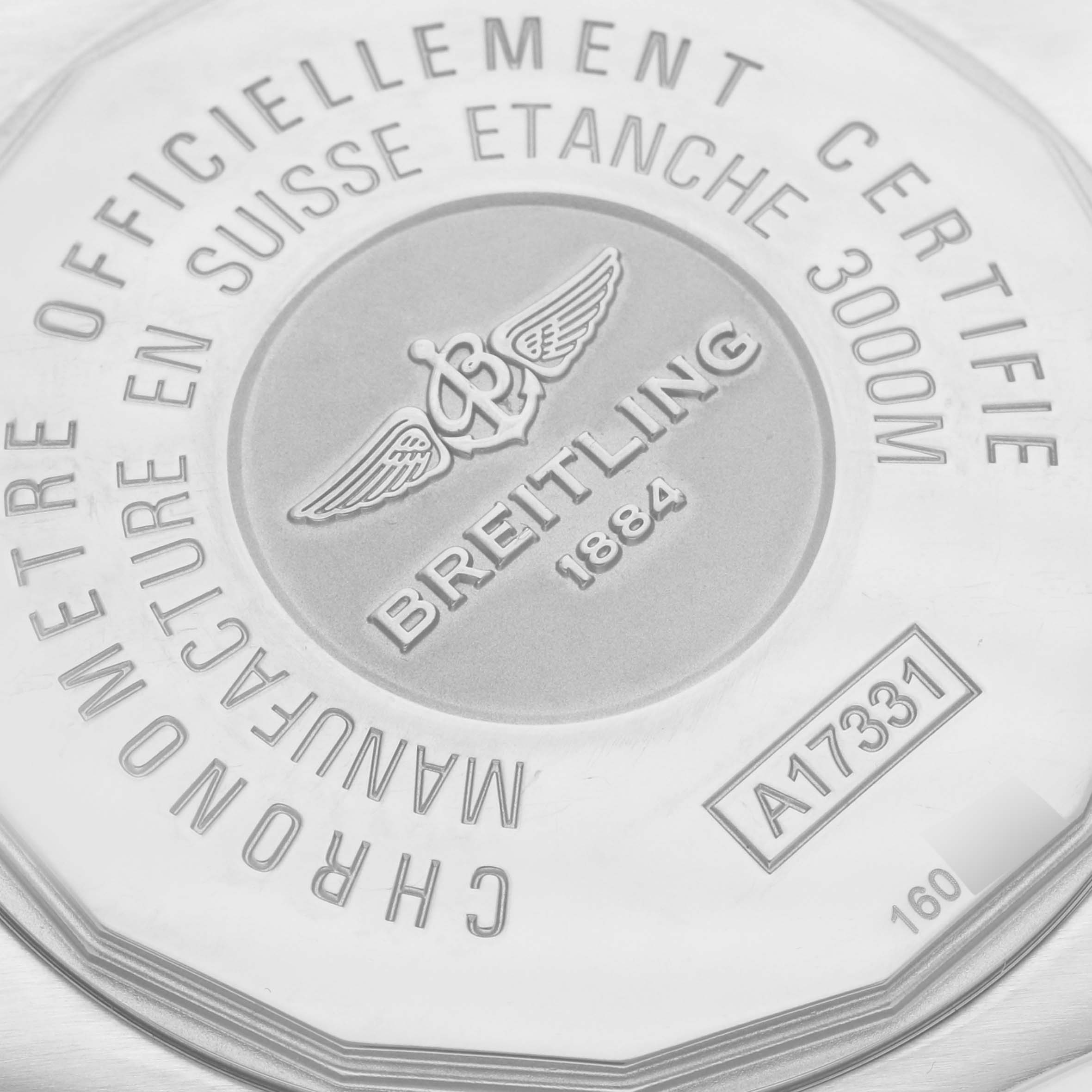 The image shows the case back of a Breitling Avenger A1733110/BC31 Men's Stainless Steel Black Dial A1733110/BC31 Men's Stainless Steel Black Dial watch, featuring engravings and the Breitling logo.