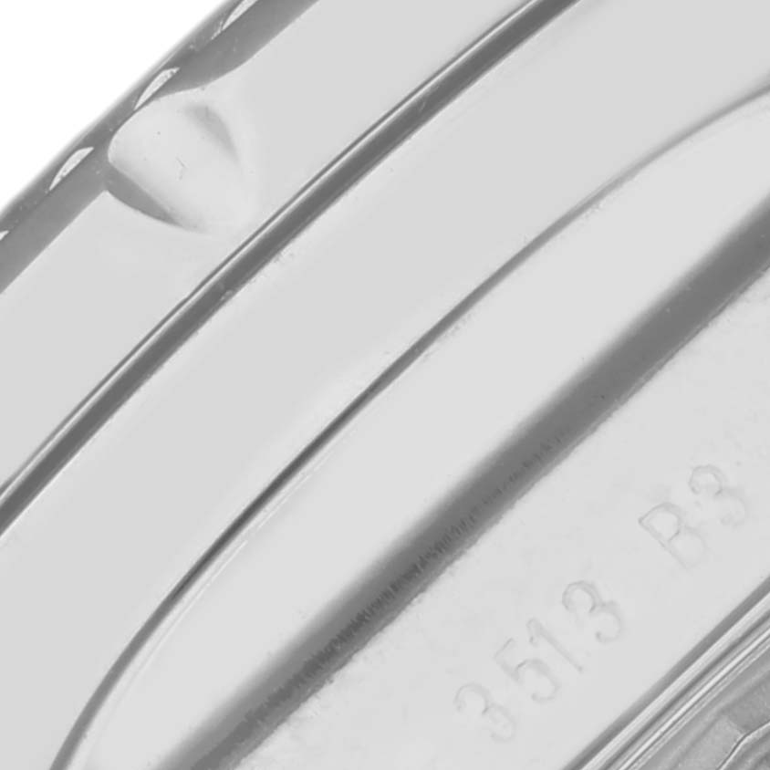 The image shows a close-up of the case side of a Breitling Bentley A13362 Men's Stainless Steel Black Dial A13362 Men's Stainless Steel Black Dial watch, highlighting its smooth metallic finish and engravings.