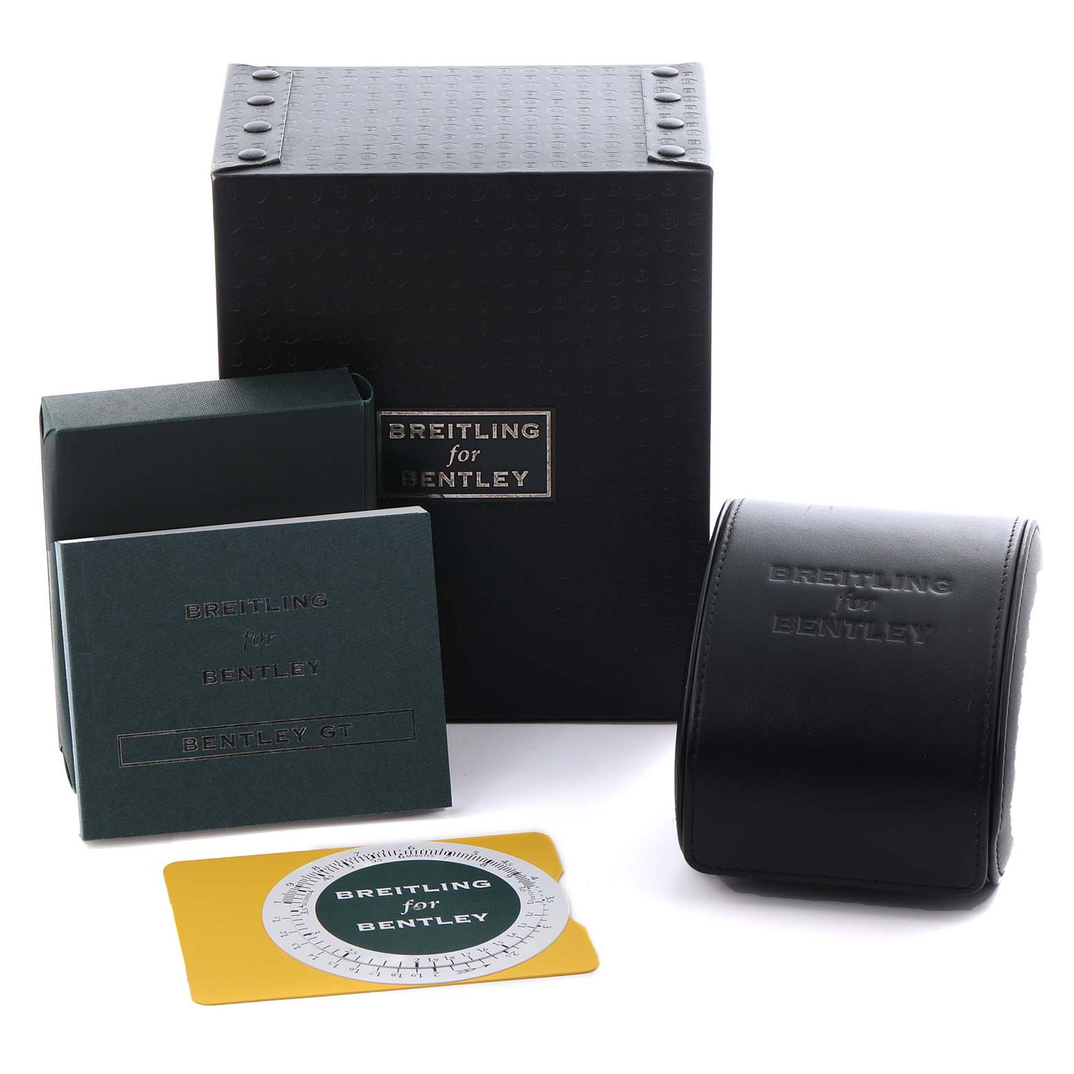The image shows packaging and accessories for a Bentley model by Breitling, including boxes, a manual, and a circular chart.