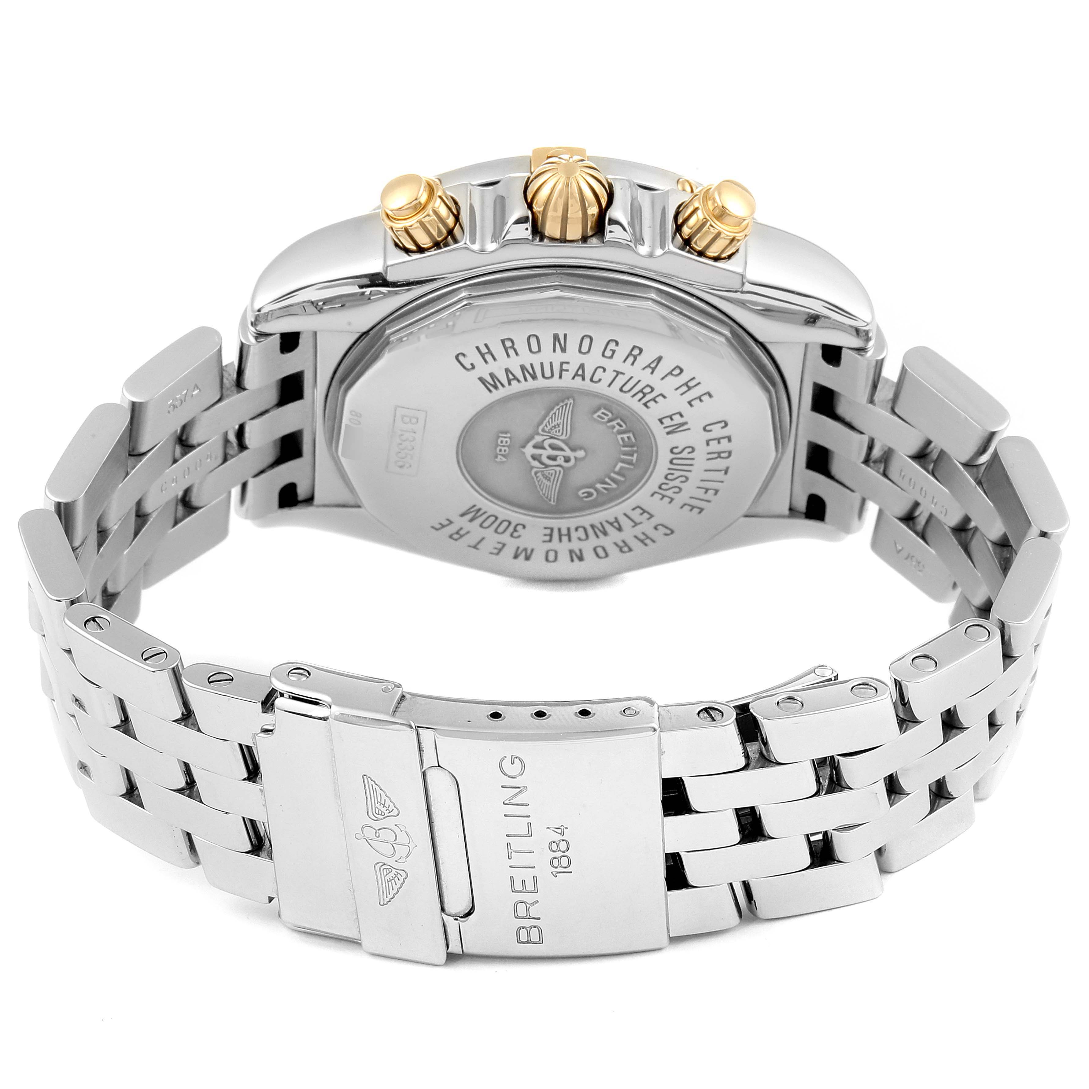 This image shows the back case and bracelet of a Breitling Chronomat B13356 Men
s Stainless Steel Black Dial B13356 Men
s Stainless Steel Black Dial watch, highlighting its stainless steel and gold components.