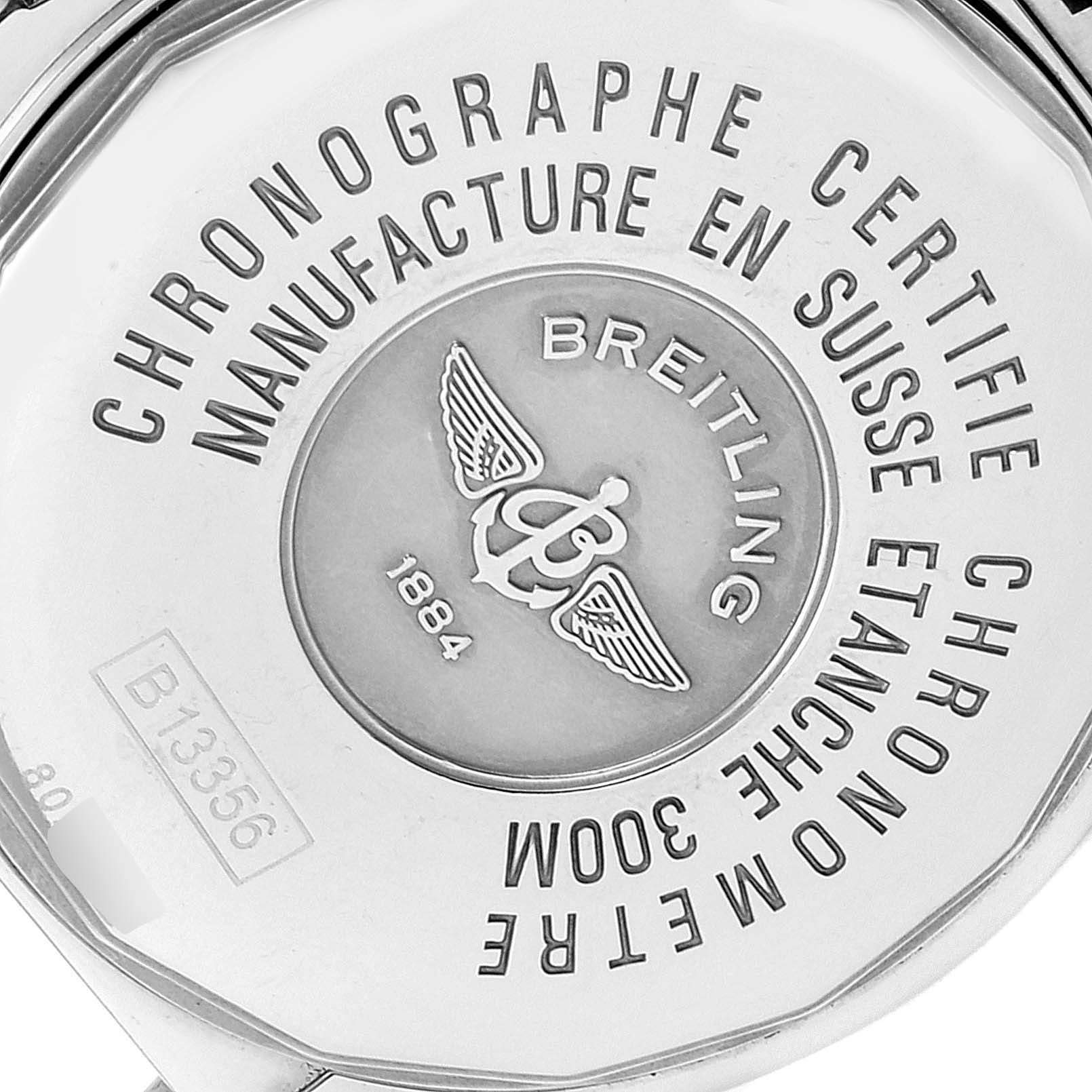 The image shows the back case of the Breitling Chronomat B13356 Men
s Stainless Steel Black Dial B13356 Men
s Stainless Steel Black Dial watch, displaying engravings of specifications and the brand
s logo.