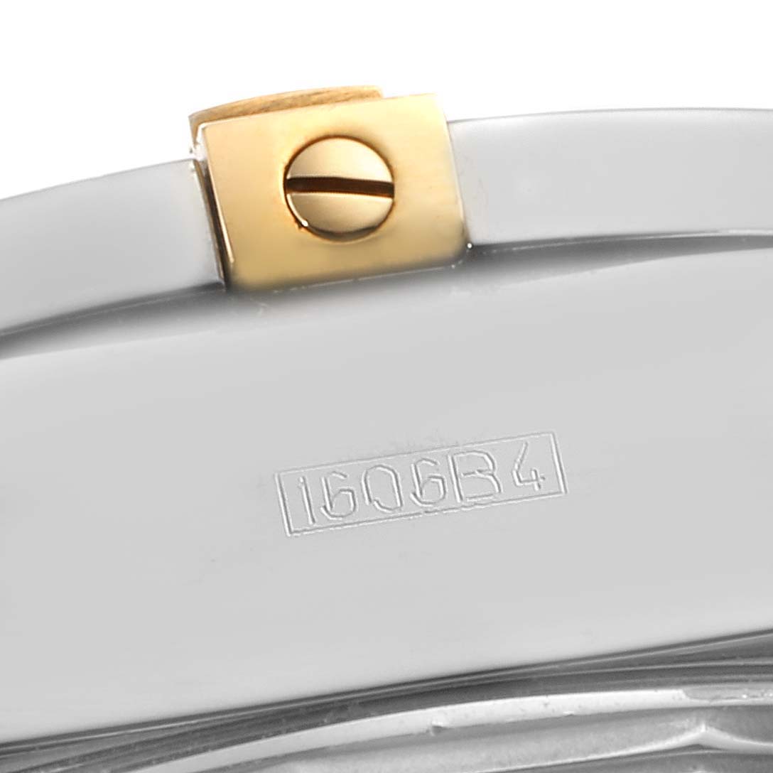 The image shows a close-up of the clasp and part of the serial number on the back of a Breitling Chronomat B13356 Men
s Stainless Steel Blue Dial B13356 Men
s Stainless Steel Blue Dial watch.