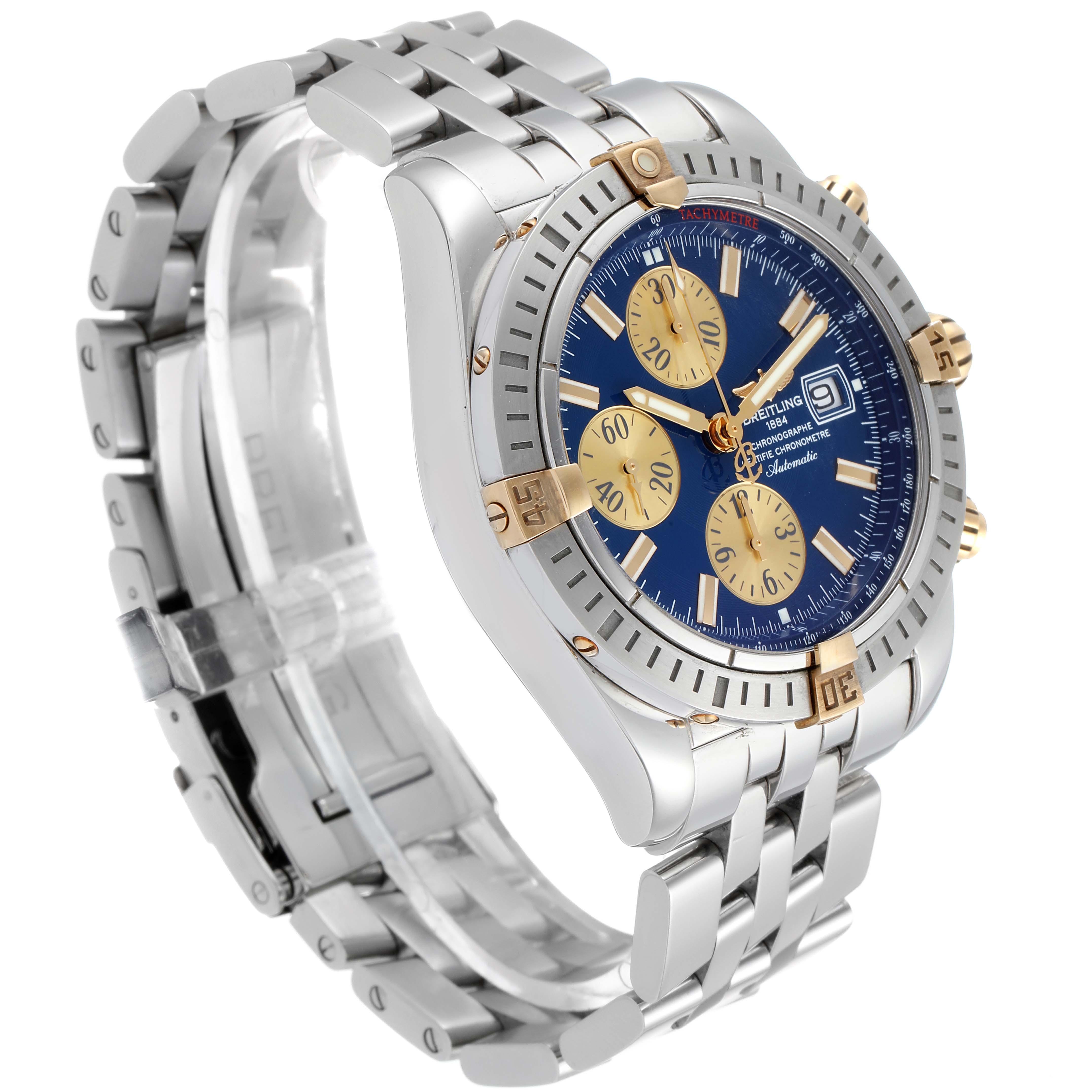 The Breitling Chronomat B13356 Men
s Stainless Steel Blue Dial B13356 Men
s Stainless Steel Blue Dial watch is shown at an angled side view, highlighting the bracelet, bezel, and dial with subdials.