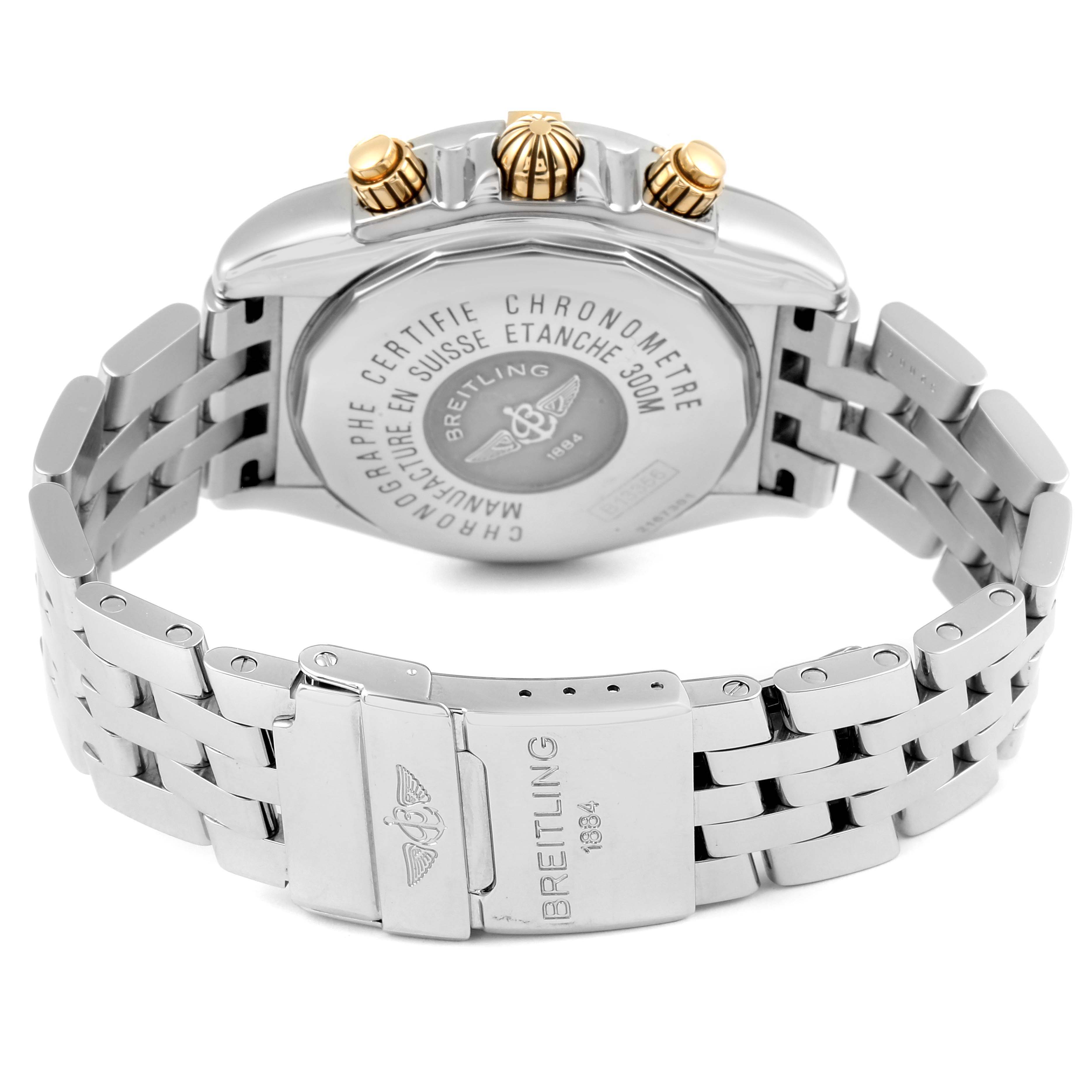 The image shows the back case and clasp of a Breitling Chronomat B13356 Men
s Stainless Steel Blue Dial B13356 Men
s Stainless Steel Blue Dial watch, highlighting the stainless steel bracelet and engraved details.