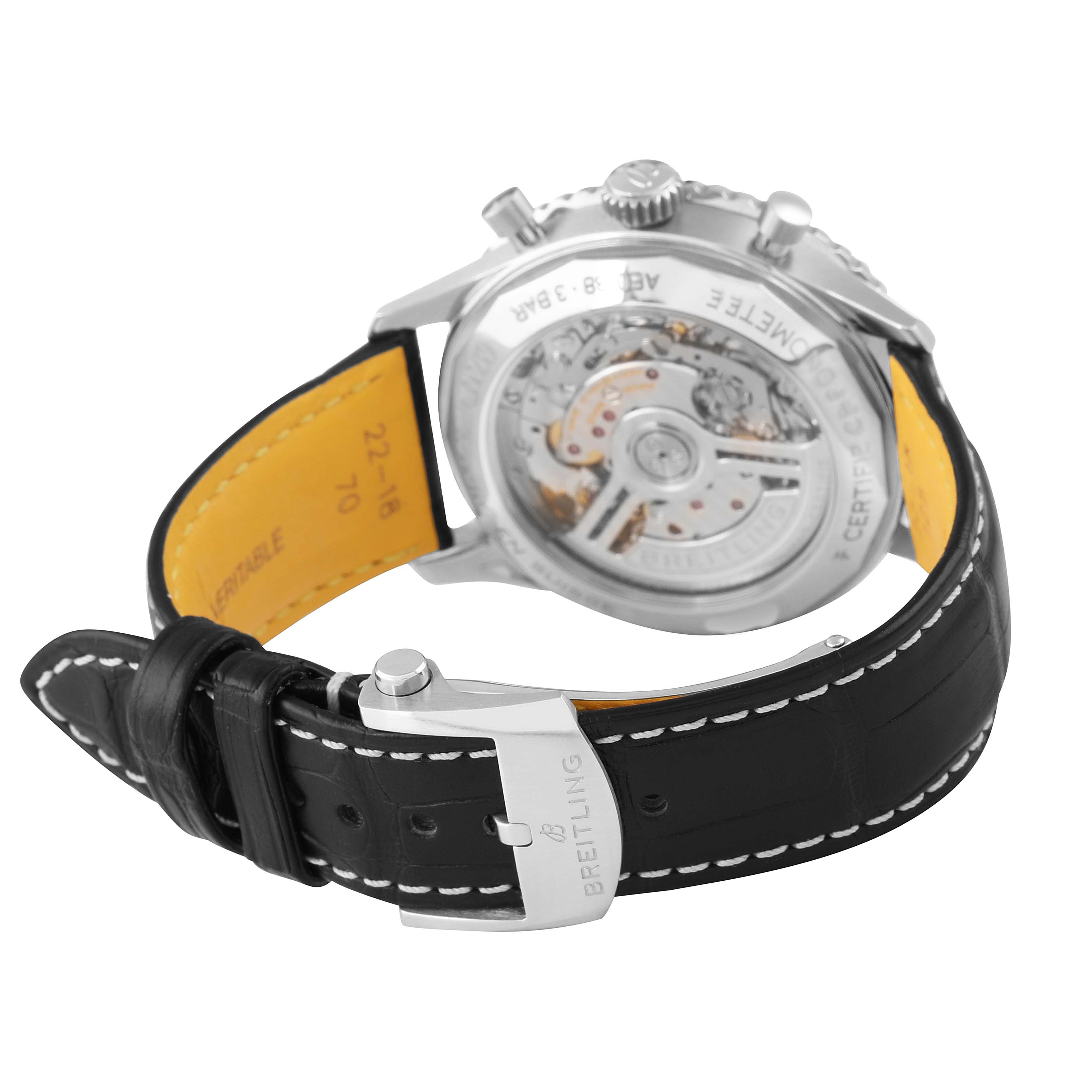 The image shows a Breitling Navitimer AB0138 Men's Stainless Steel Brown Dial watch from the back, highlighting the transparent case back and black leather strap.