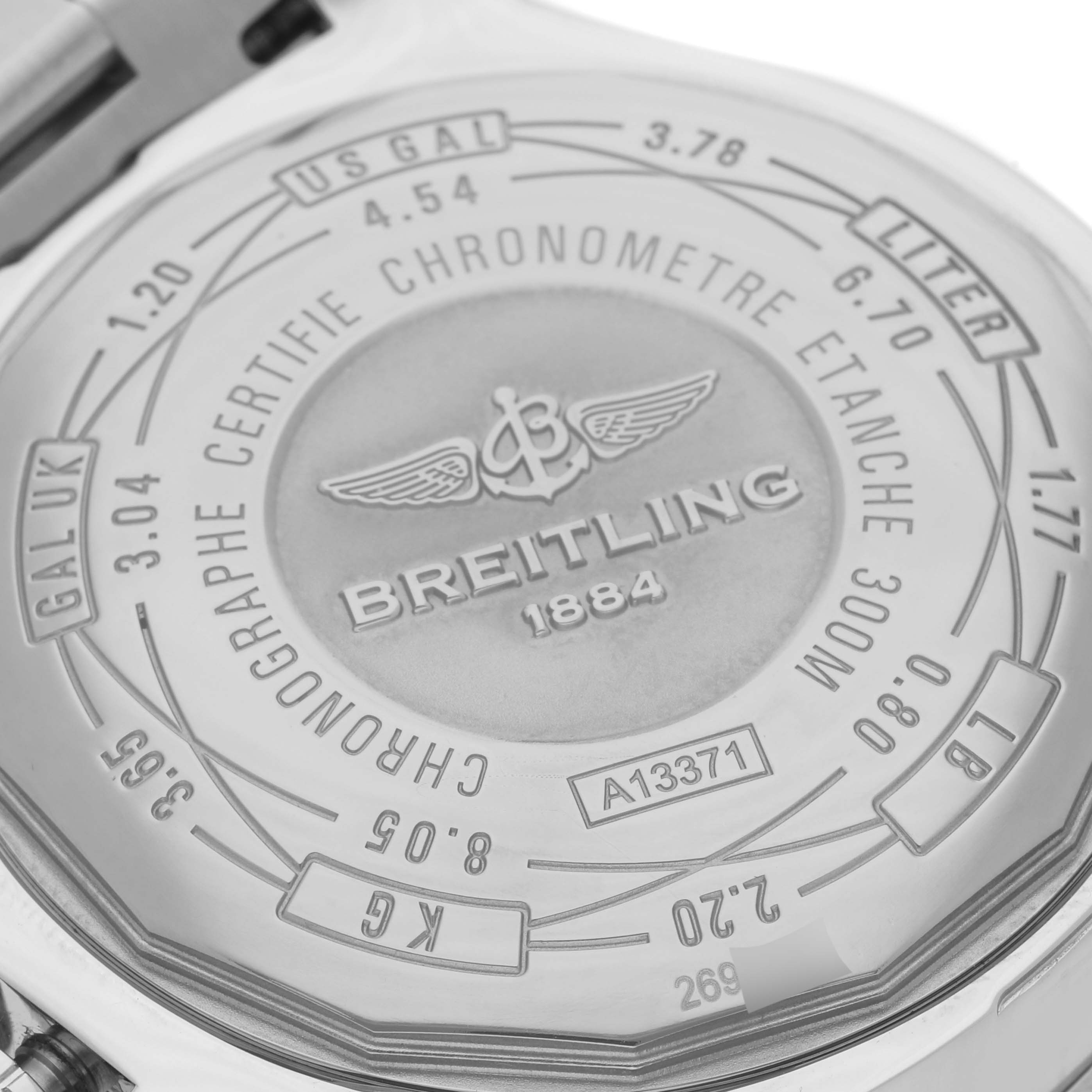 The image shows the back case of a Breitling Avenger A13371 Men's Stainless Steel Black Dial A13371 Men's Stainless Steel Black Dial watch, highlighting engravings including the brand logo and specifications.