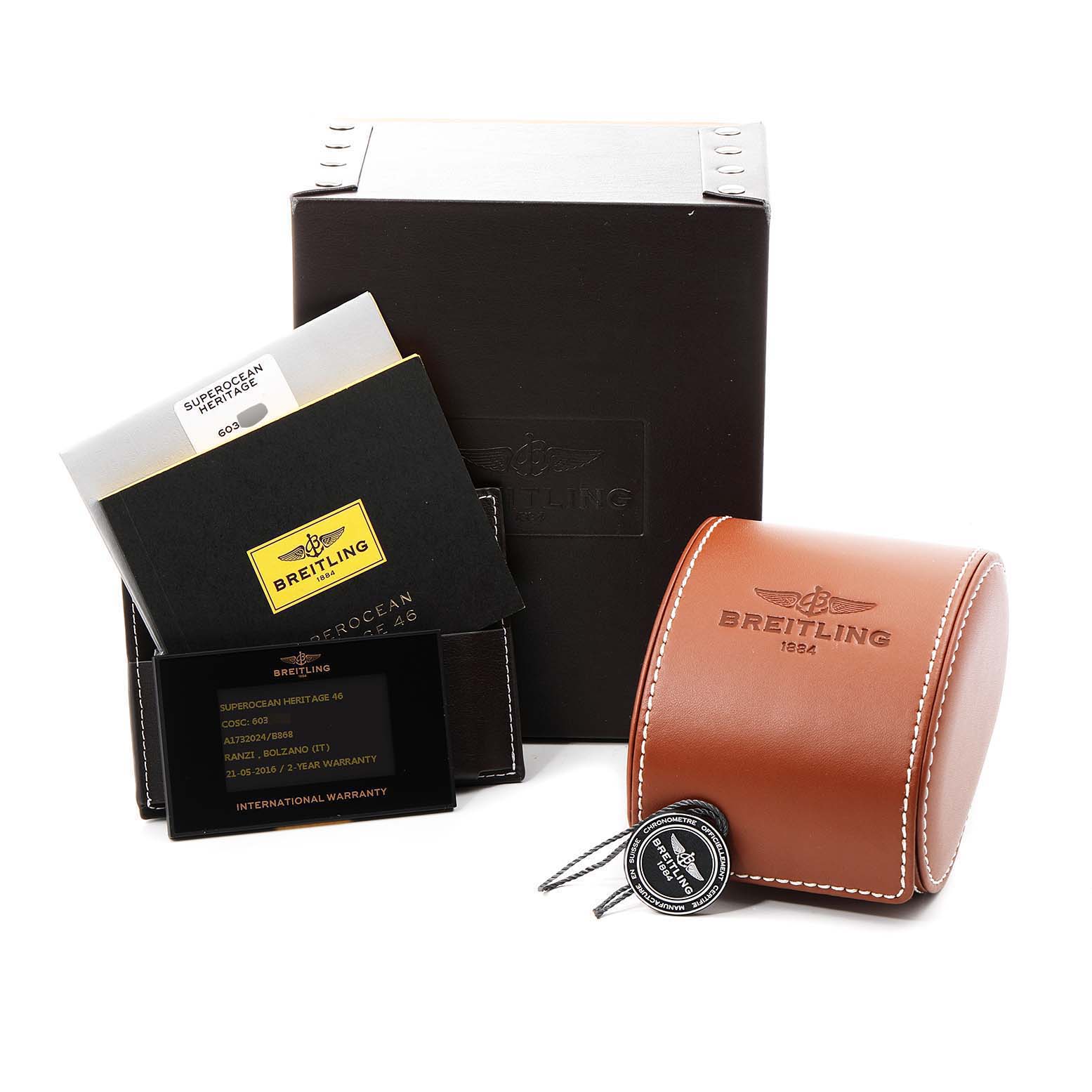 The image shows the box, warranty card, booklet, and leather case for the Breitling Superocean A17320 Men
s Stainless Steel Black Dial A17320 Men
s Stainless Steel Black Dial watch model.