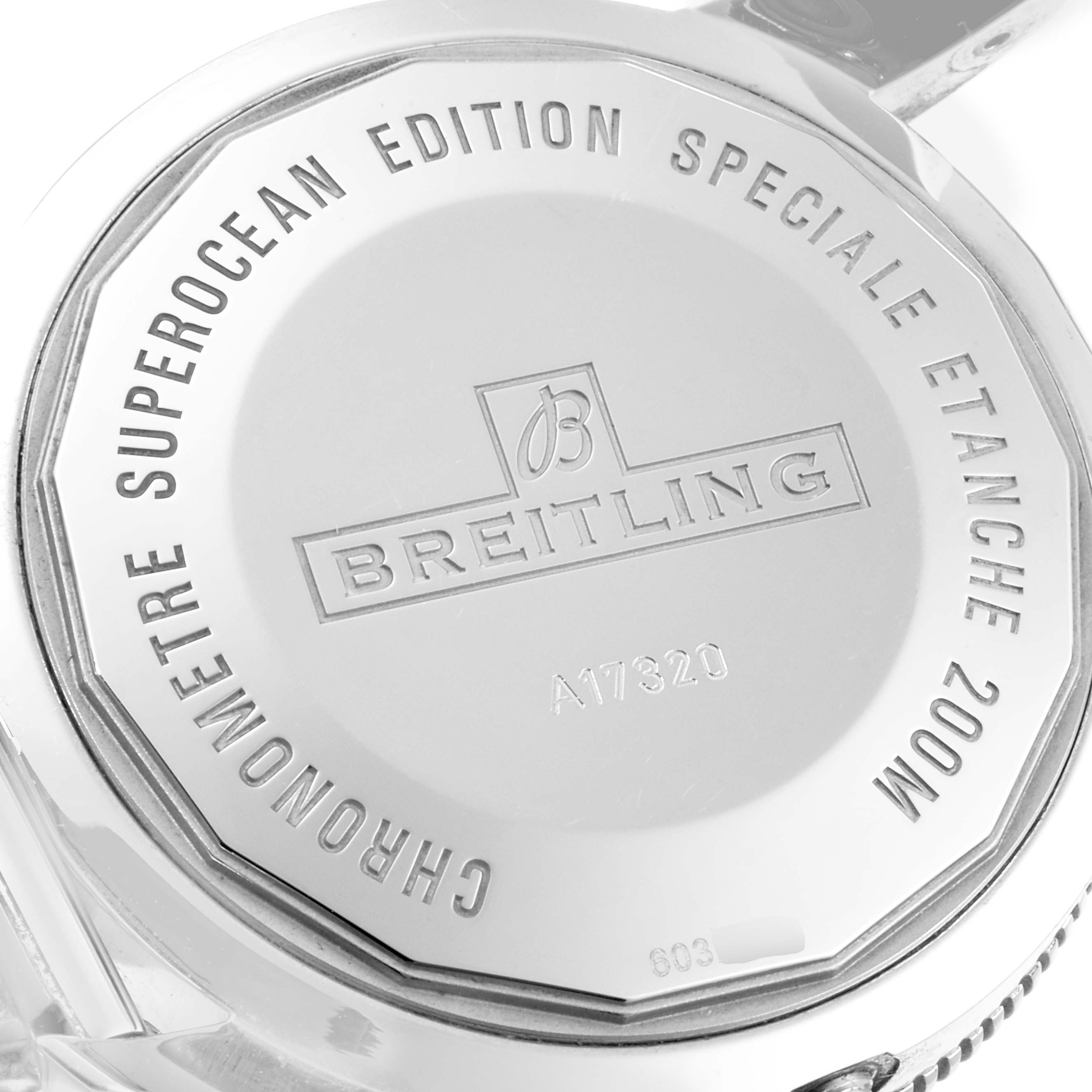 The image shows the back case of a Breitling Superocean A17320 Men
s Stainless Steel Black Dial A17320 Men
s Stainless Steel Black Dial watch, displaying brand engravings and specifications.
