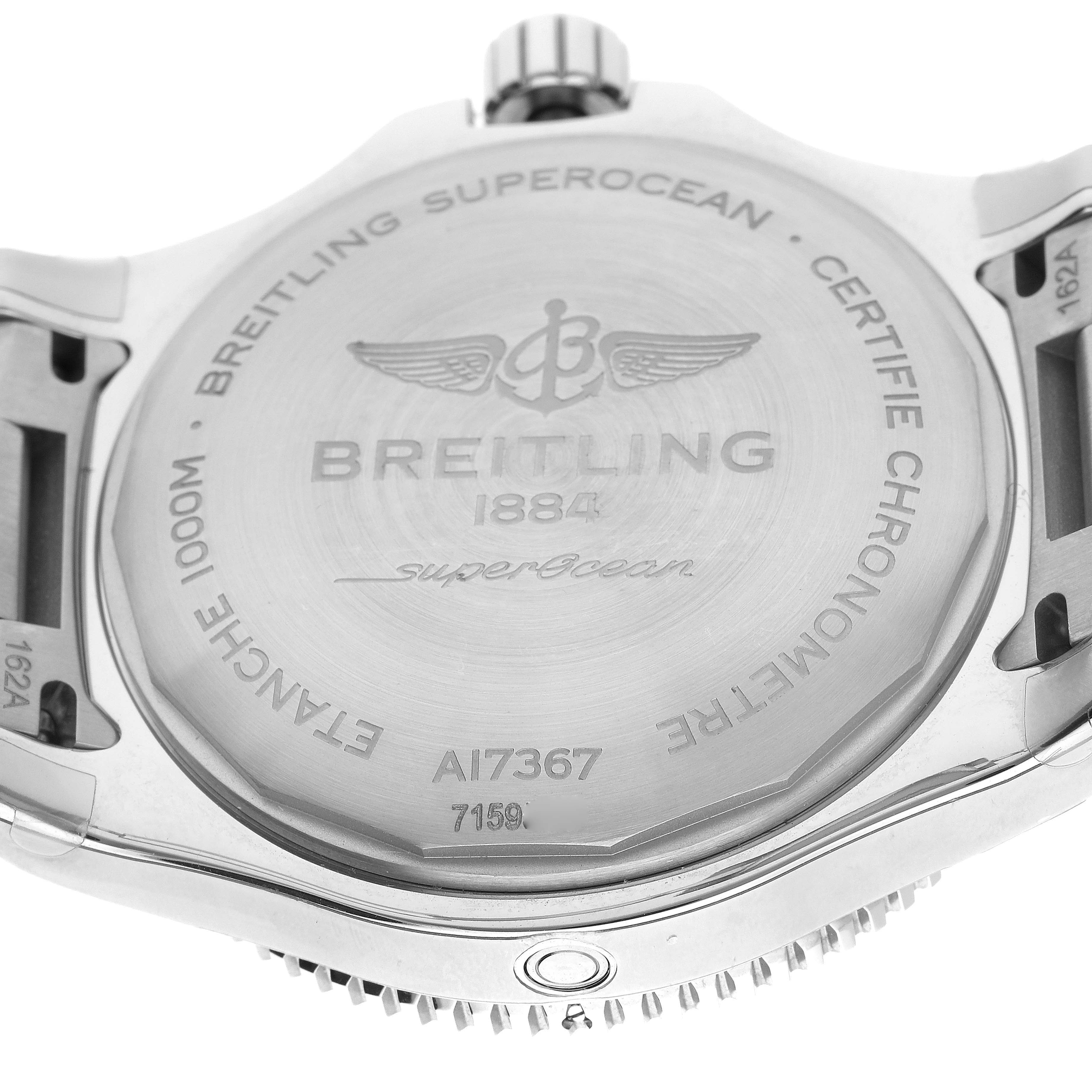 The image shows the back case of a Breitling Superocean A17367 Men's Stainless Steel Yellow Dial A17367 Men's Stainless Steel Yellow Dial watch, highlighting the engraved details and the crown at the top.