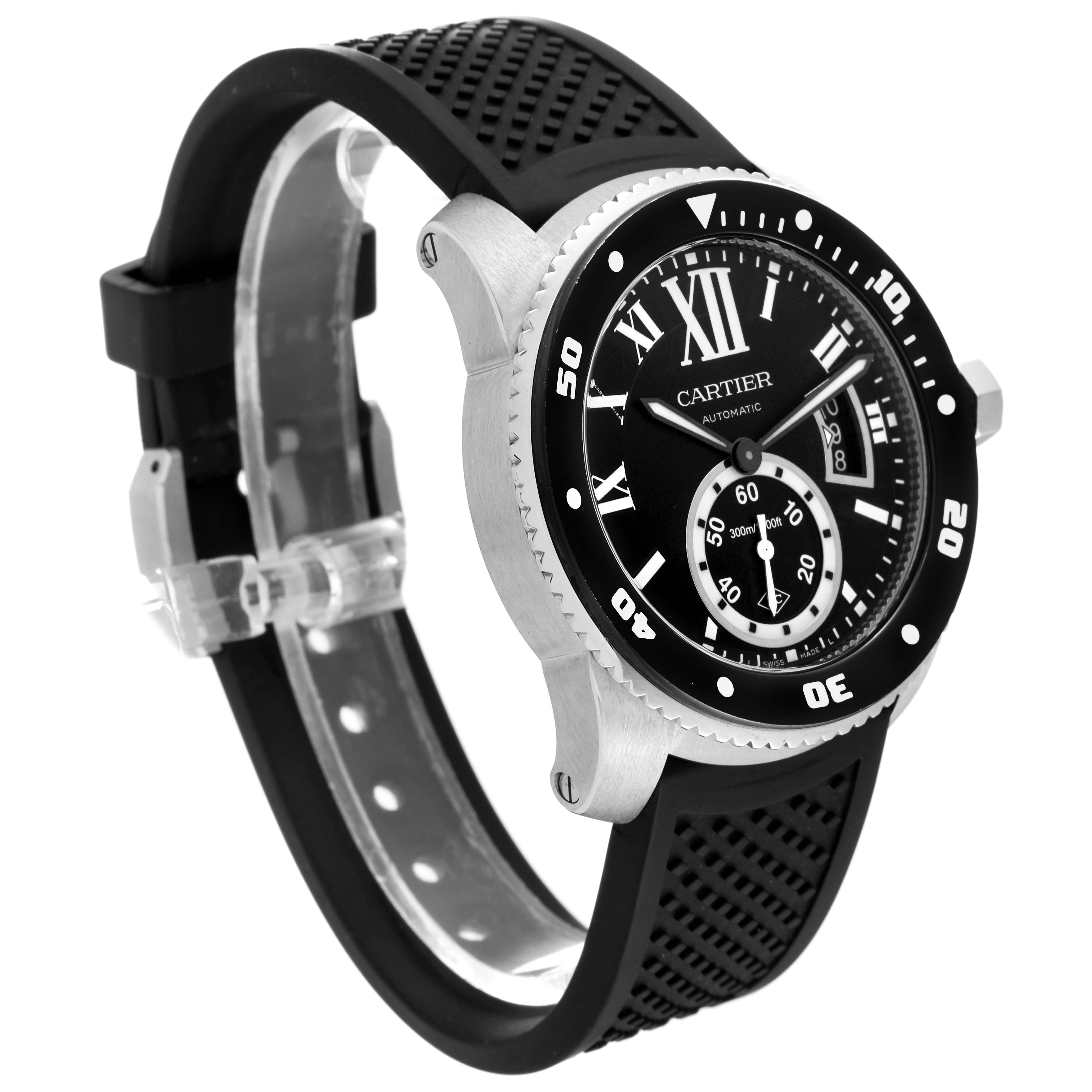 The image shows a Calibre de Cartier watch by Cartier, focusing on its black bezel, dial, and rubber strap, angled front-left.