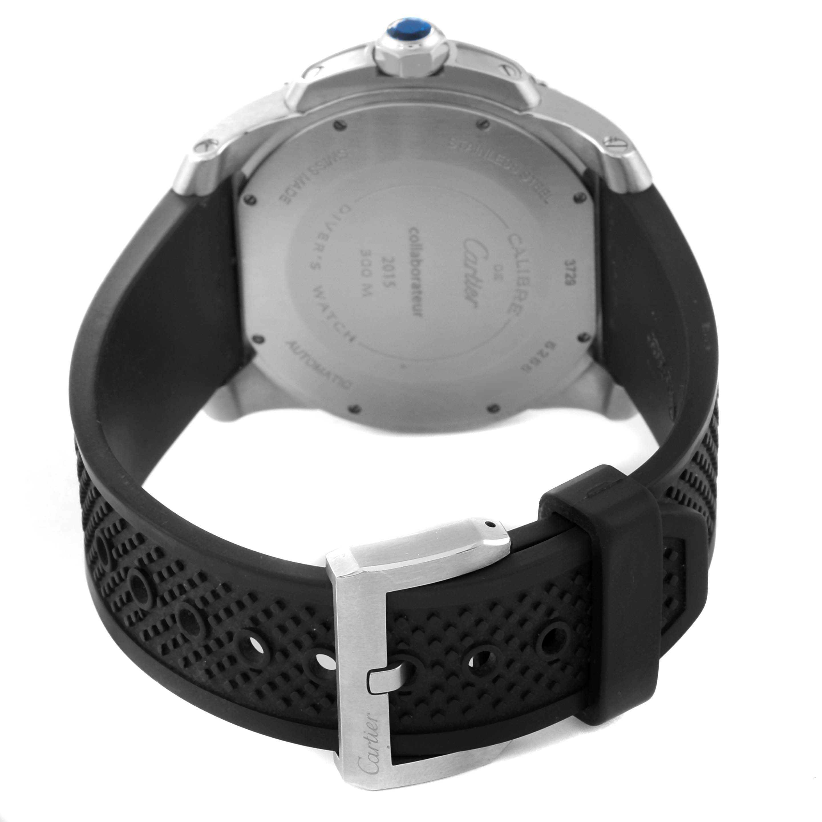 The image shows the back of a Calibre de Cartier watch by Cartier, highlighting the strap, buckle, and case back.