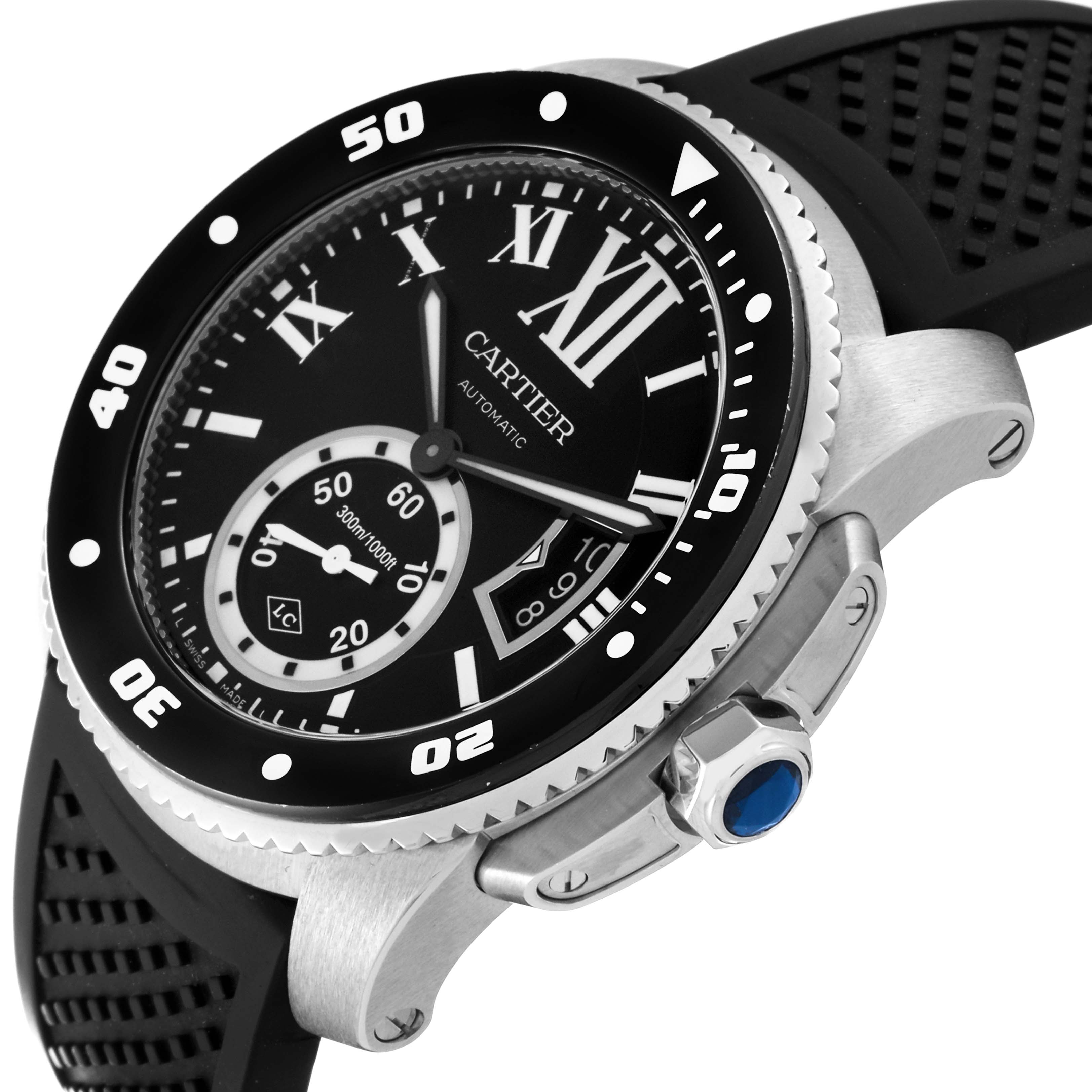 The image shows a close-up of the Calibre de Cartier watch by Cartier, focusing on the dial, bezel, and crown from a slight side angle.