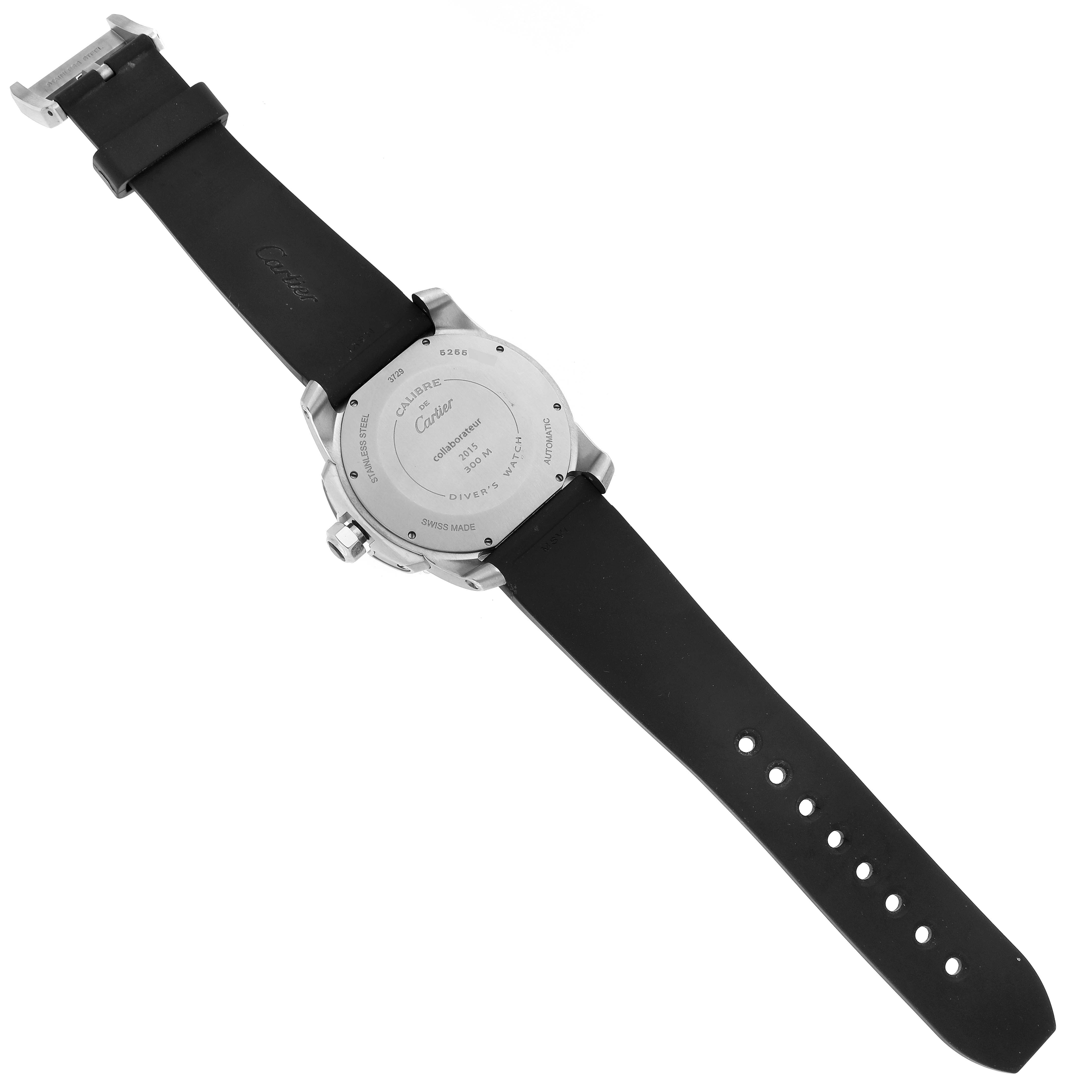 The image shows the back view of a Calibre de Cartier watch by Cartier, displaying its case back and black strap.