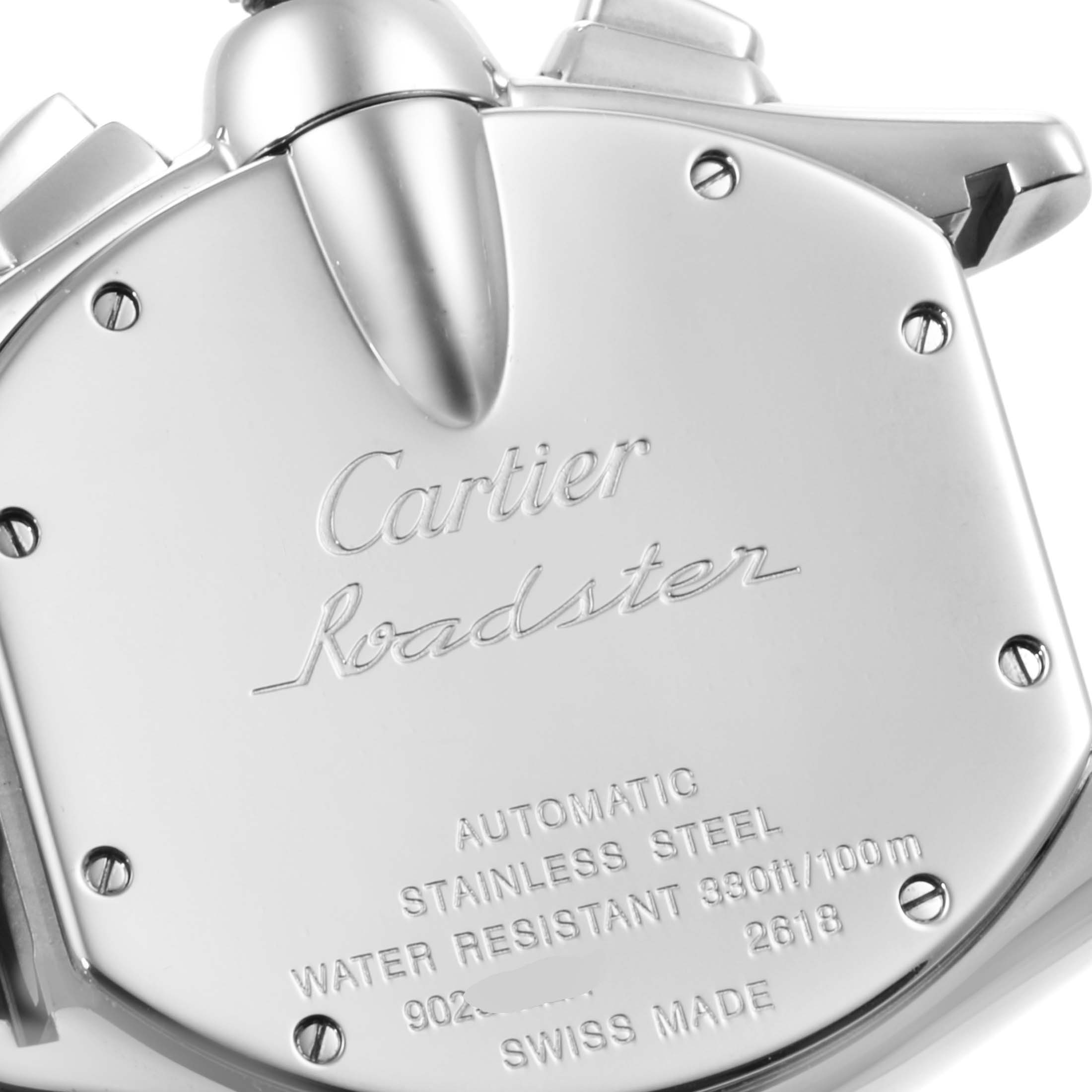 The image shows the case back of a Cartier Roadster W62020X6 Men
s Stainless Steel Black Dial W62020X6 Men
s Stainless Steel Black Dial watch, highlighting the engraved details and fastening screws.